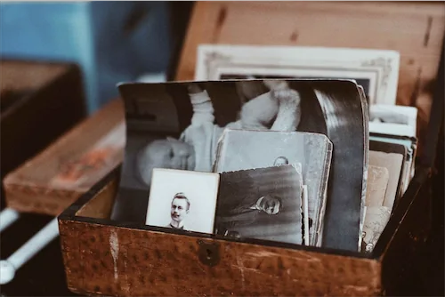 Box full of old black and white photos