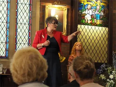 Tatjana demonstrating at Longton with hand showing area